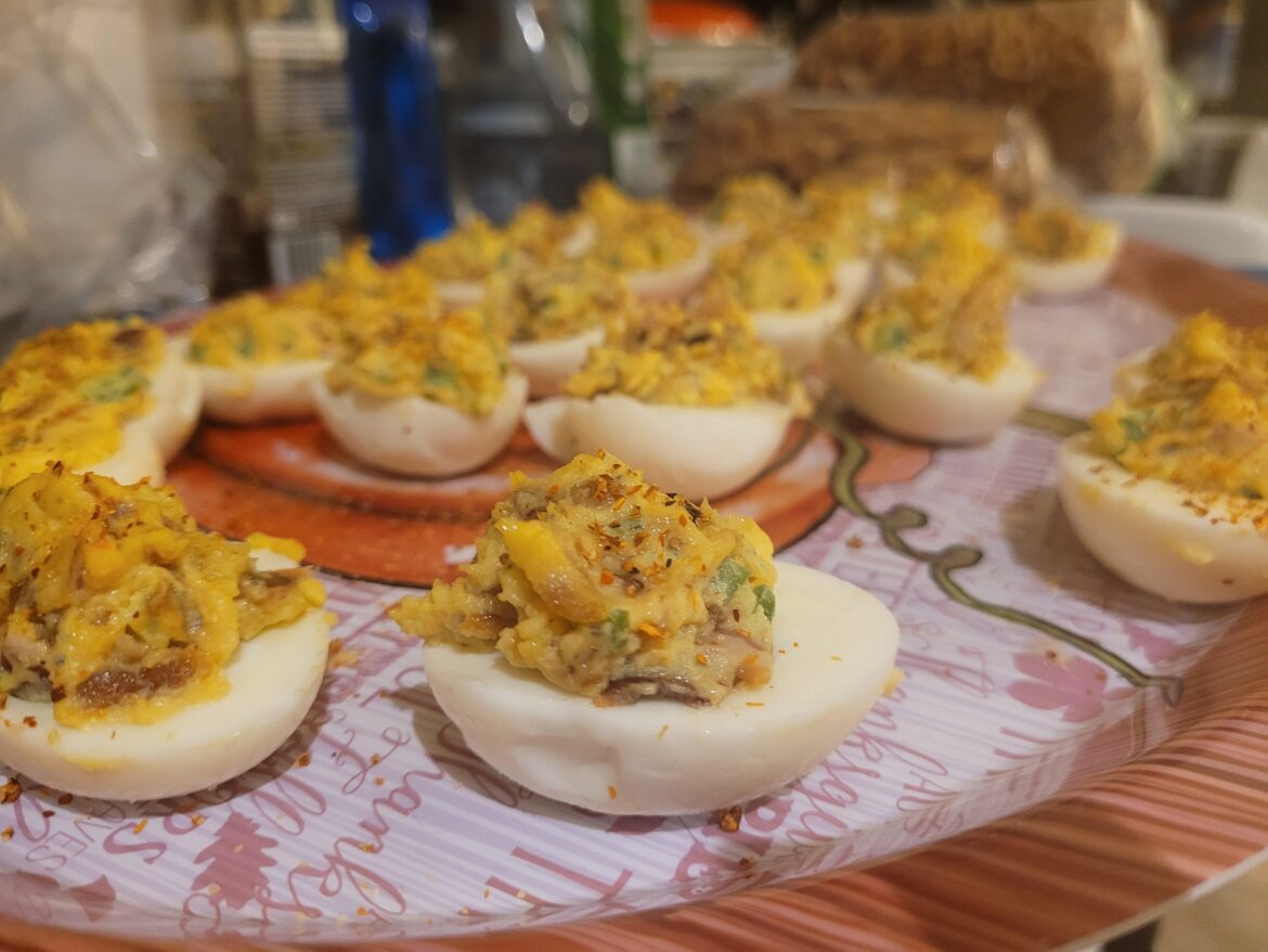 Caramelized onion, candied black pepper bacon and jalapeño deviled eggs