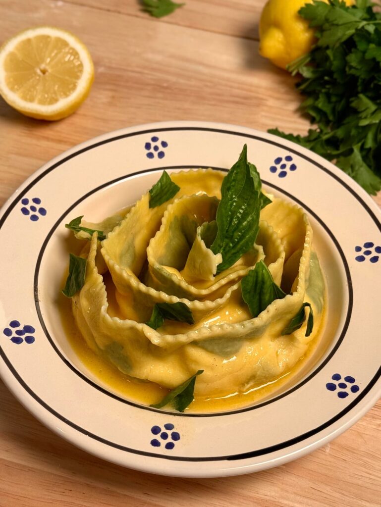 Herb-laminated pappardelle ripiene with ricotta and lemon filling