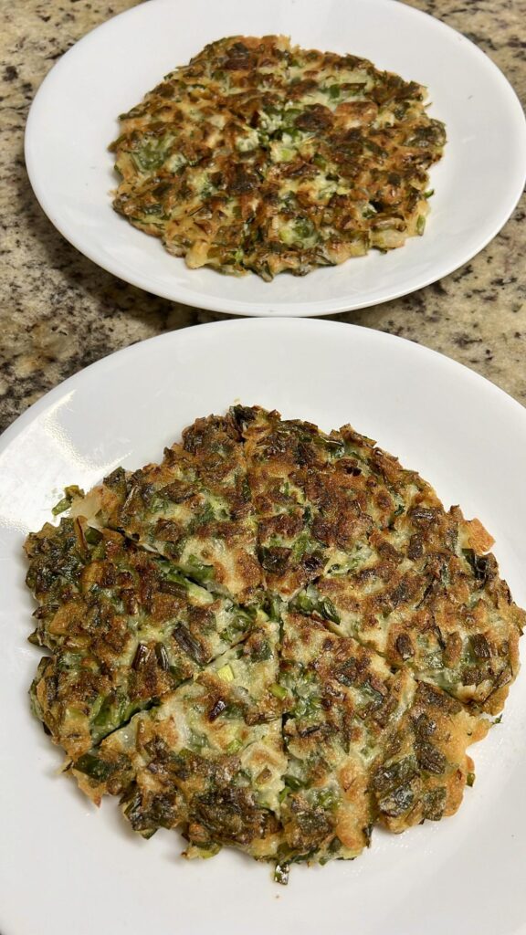 Savory chive pancakes with freshly harvested chives