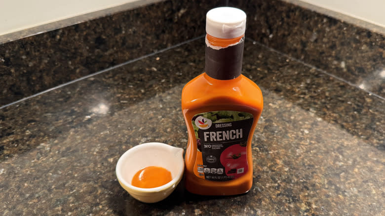 Stop & Shop French dressing next to small white dish containing dressing