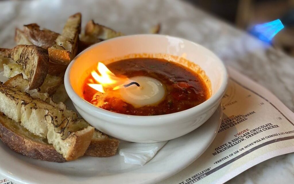 7 unique appetizers you need to try in Birmingham including OvenBird's beef fat candle