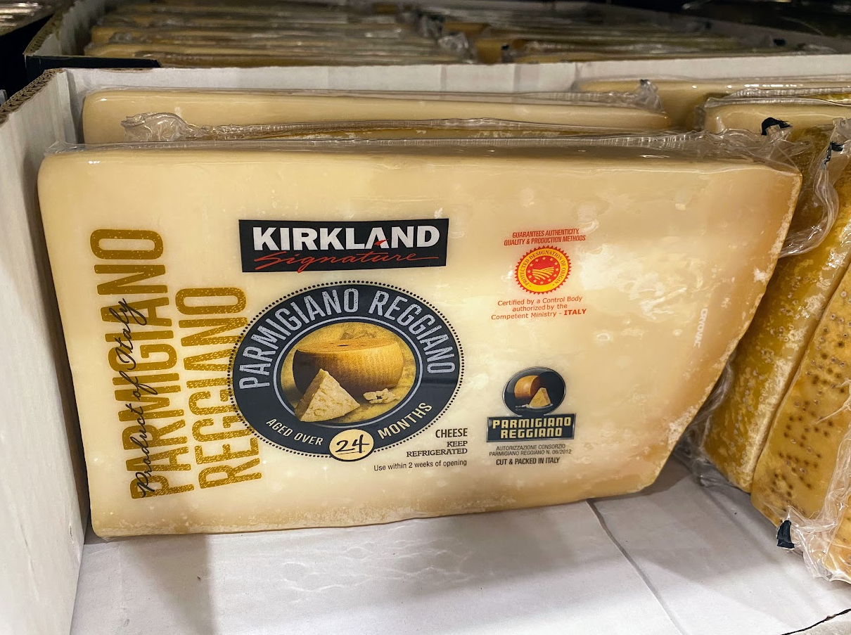 A group of cheeses on a shelf