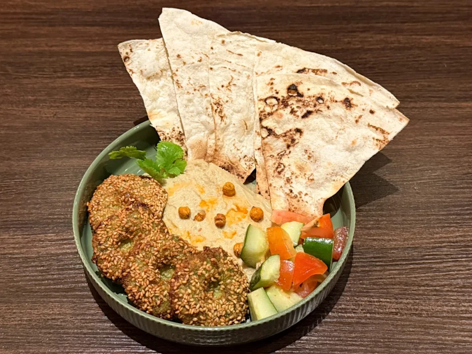 Falafel & Hummus is the ideal starter with fluffy chickpea fritters, hummus and thin, shattering-crisp flatbread. — Picture by Lee Khang Yi