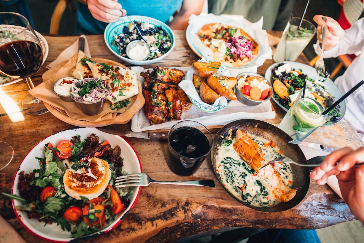 Happy people sharing their healthy lunch