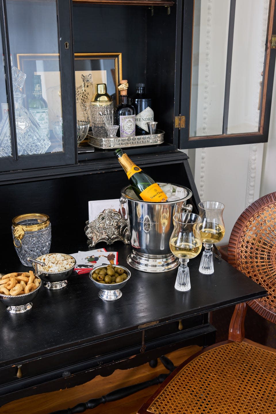 elegant cocktail setting with beverages and snacks