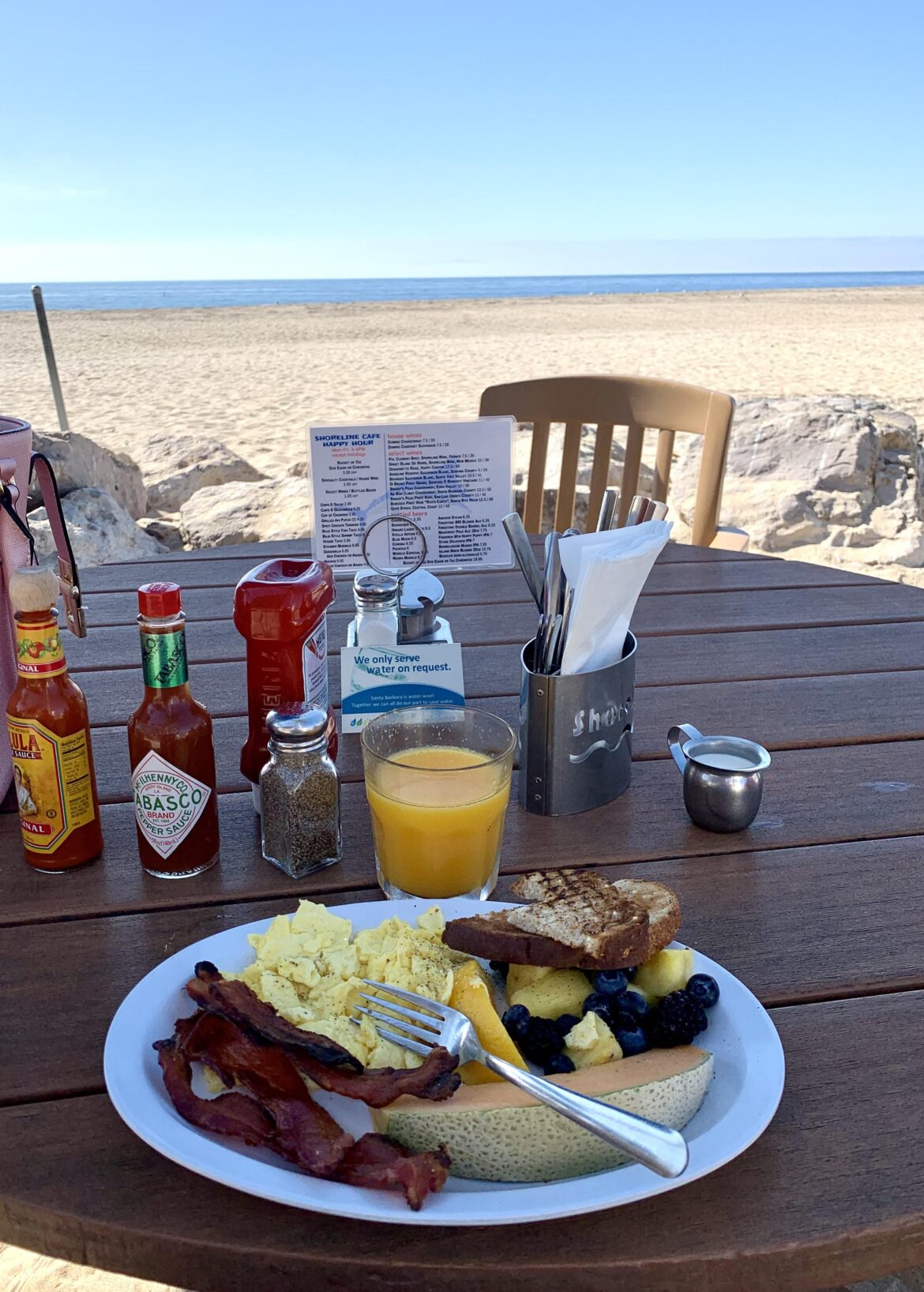 Breakfast with a View: Eggs, Bacon, Toast & Fruit