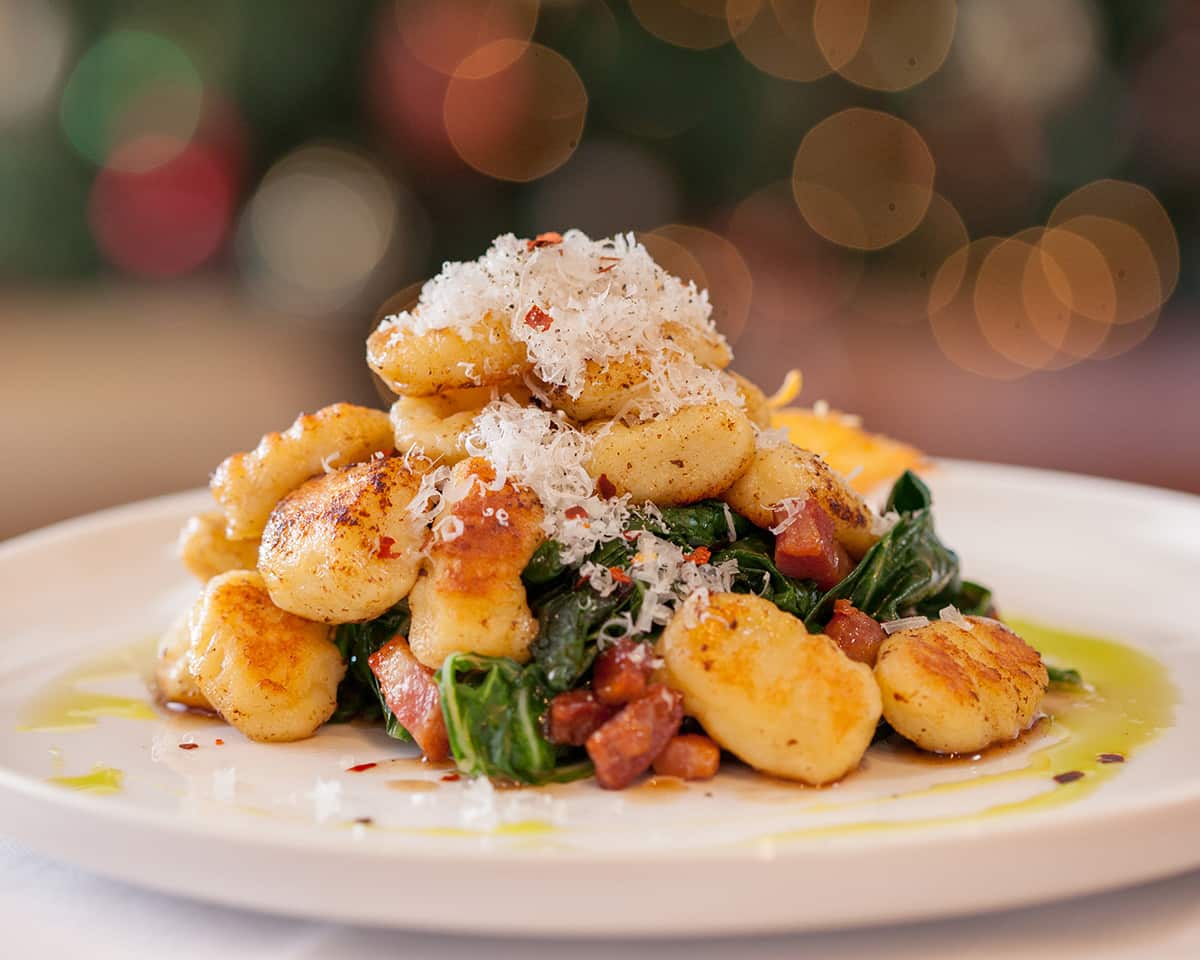 Potato ricotta gnocchi with braised greens