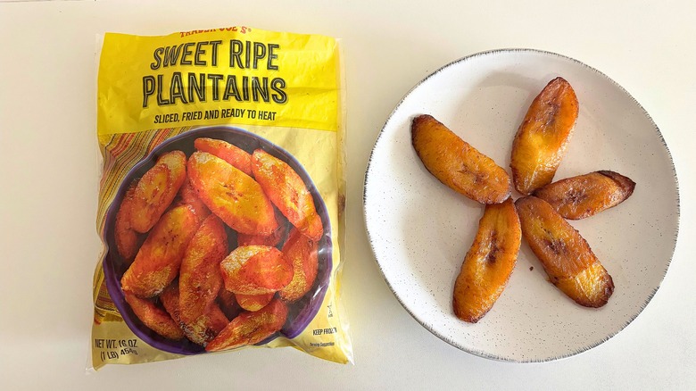 Trader Joe's Sweet Ripe Plantains next to a bag on white table