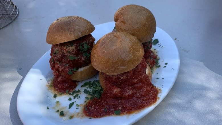 plate of three meatball sliders