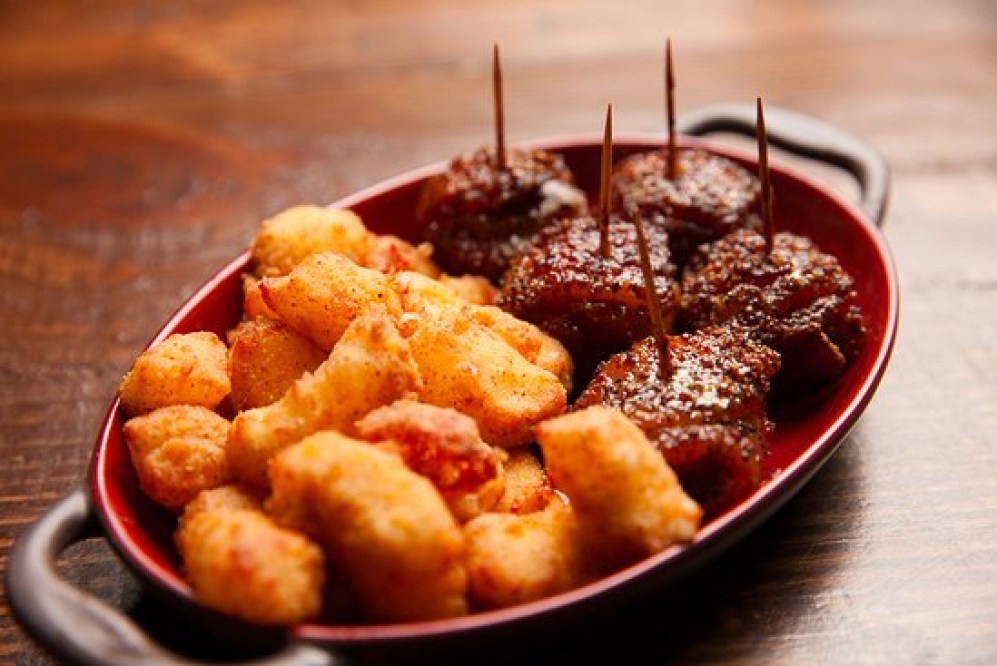 candied bacon bombs served 7 unique appetizers you need to try in Birmingham including OvenBird's beef fat candle