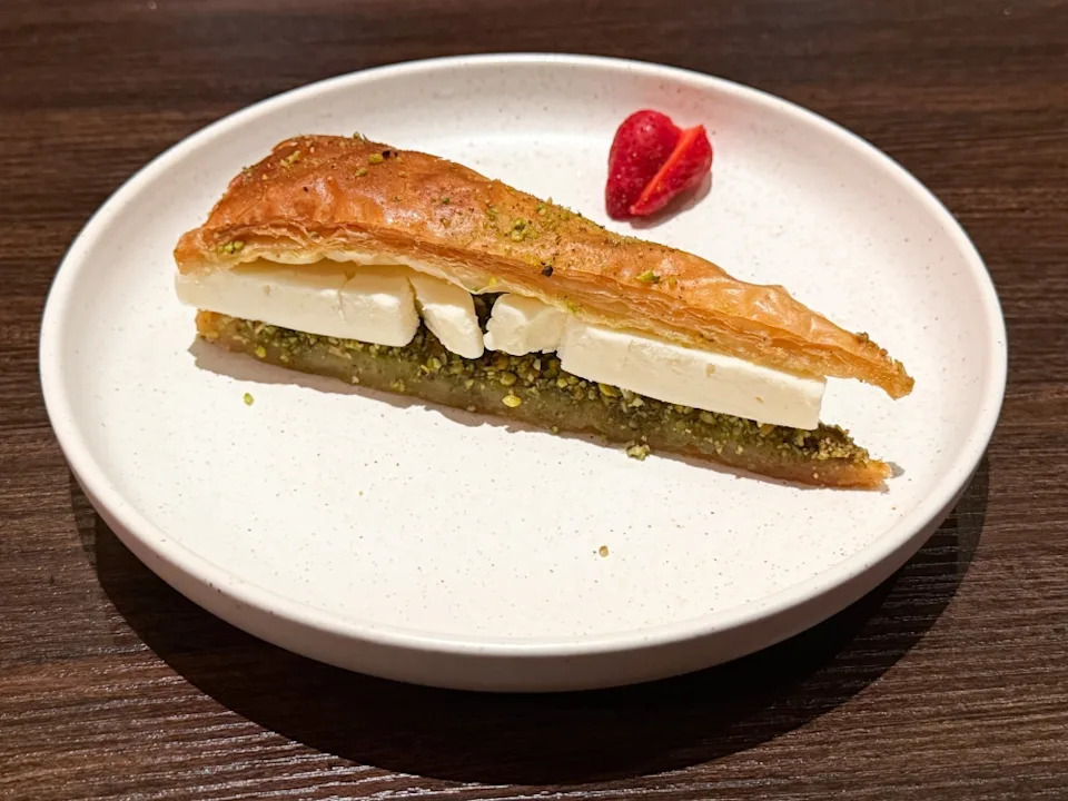 Sweet treat comes in the form of a Pistachio Baklava served with ice cream. — Picture by Lee Khang Yi