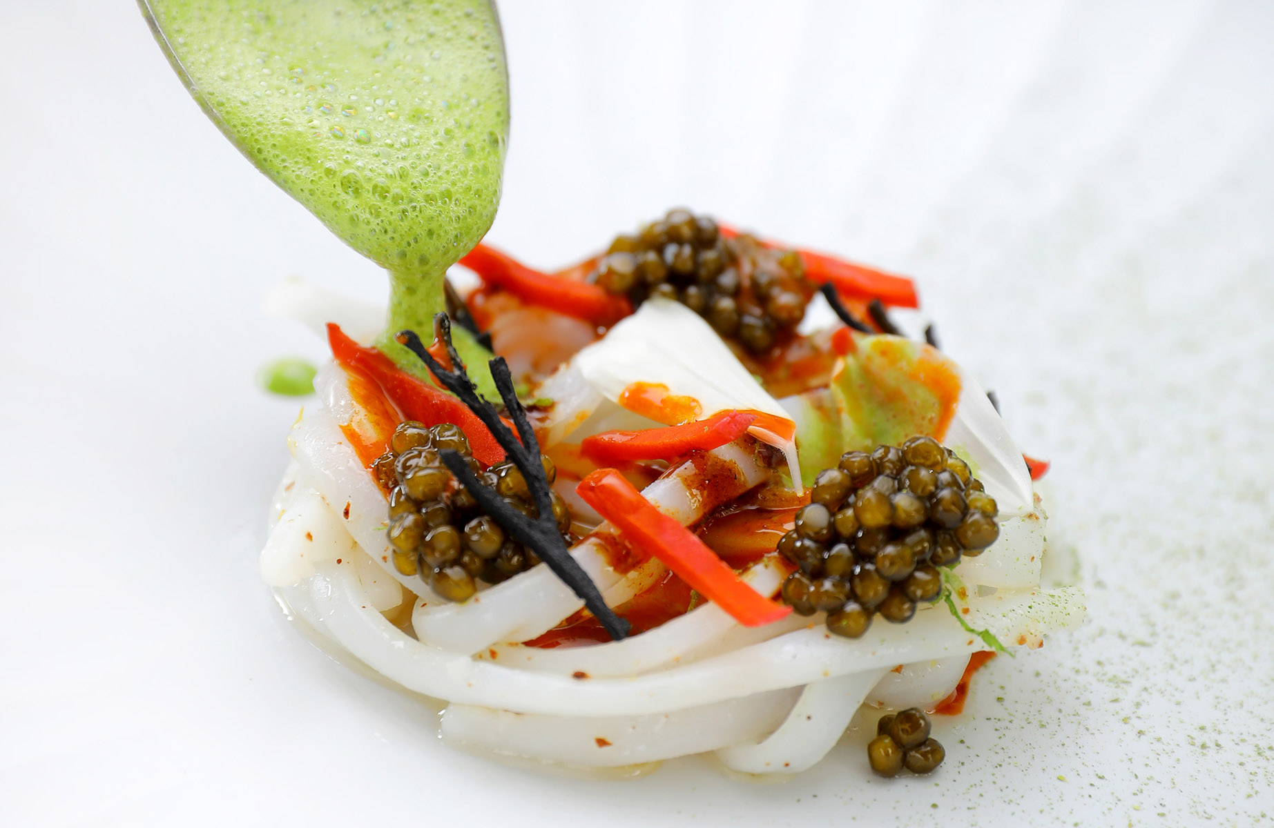 Gulf of Lion squid and fermented carrot extraction at La Table Lionel Giraud. © Agence Le Petit Gastronome/La Table Lionel Giraud