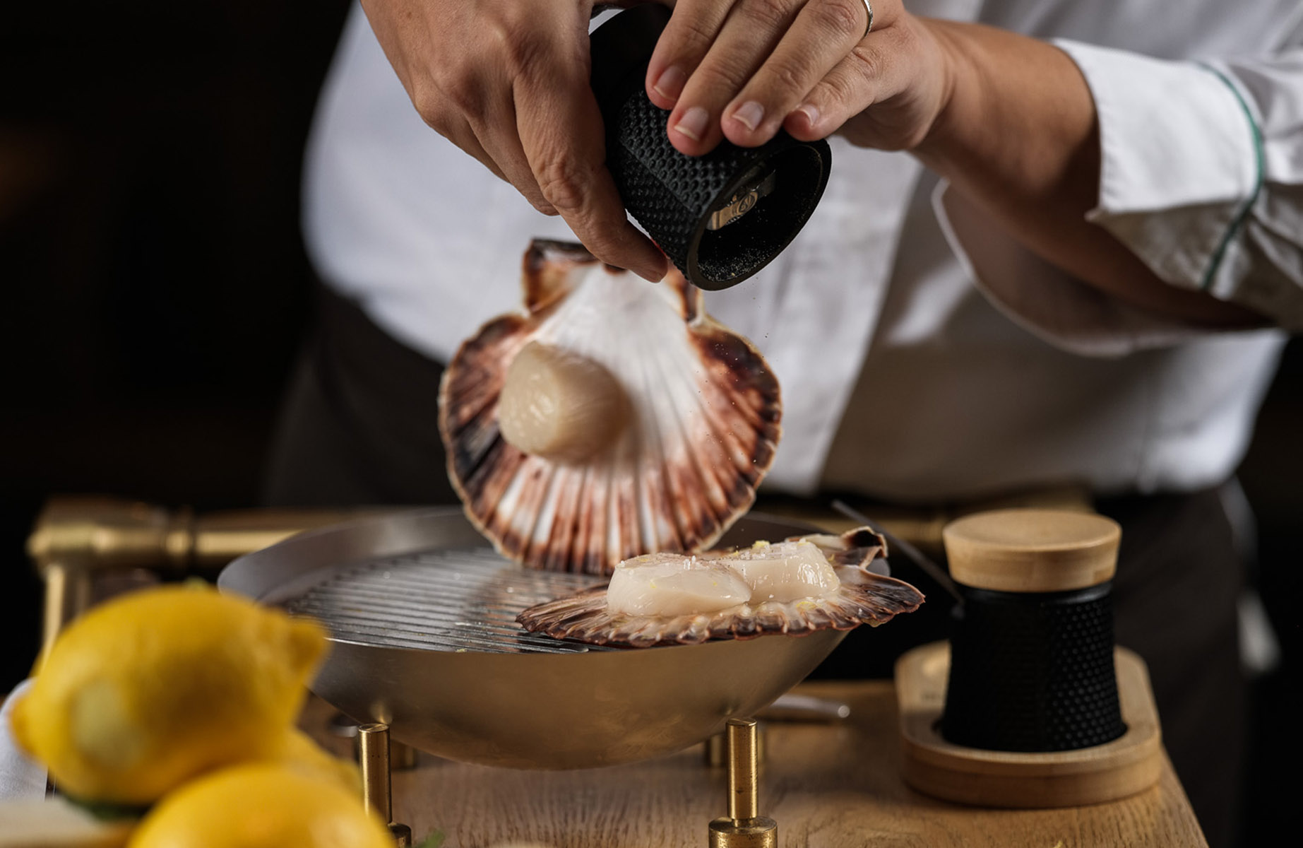 Raw scallops, sea urchin and lovage at La Scène in Paris. © Stéphane RISS/La Scène