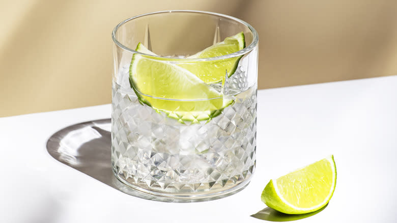 lime and tonic drink in glass