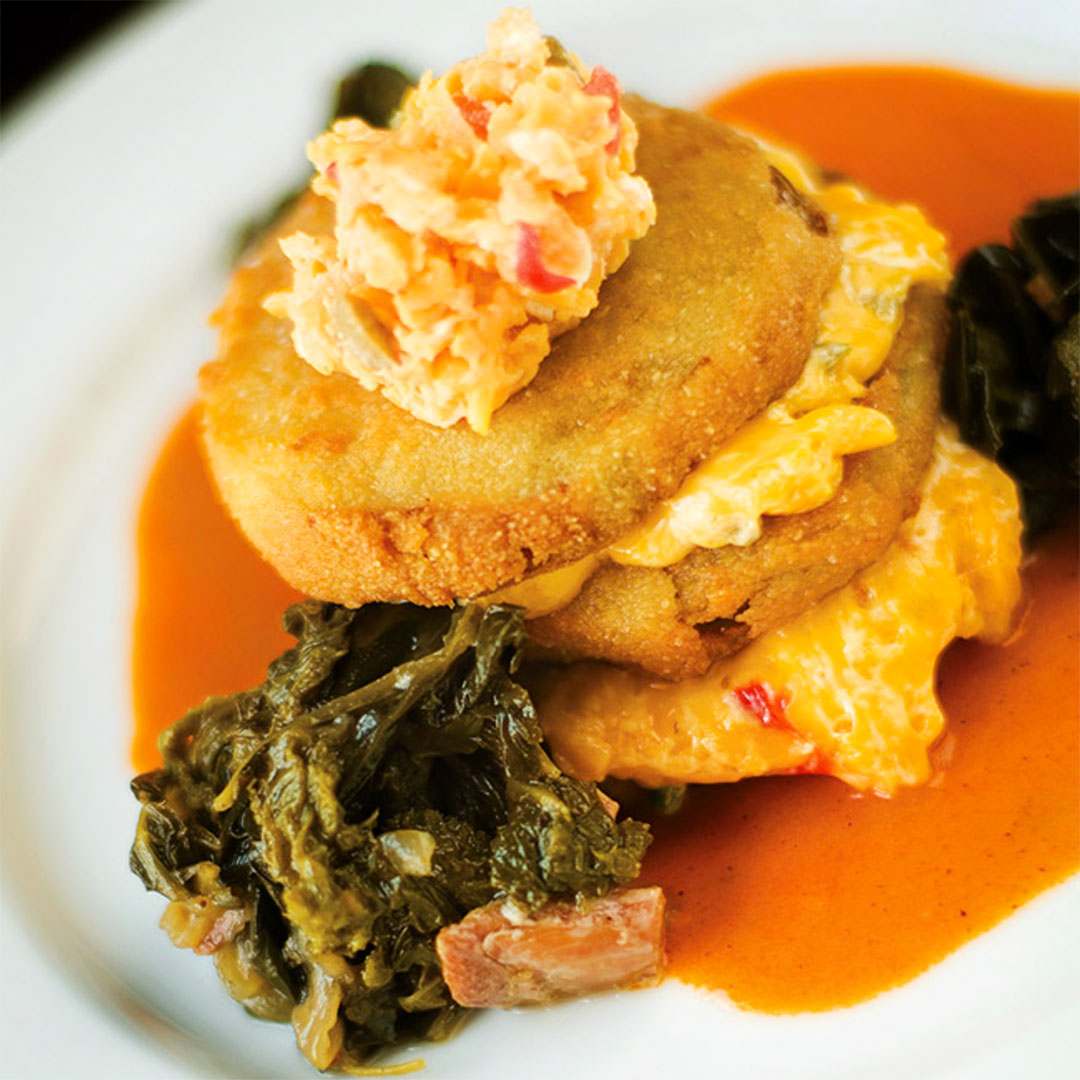 Pimento cheese is the ultimate topper for the fried green tomatoes at Soby's. © Ariel Madison/Soby's