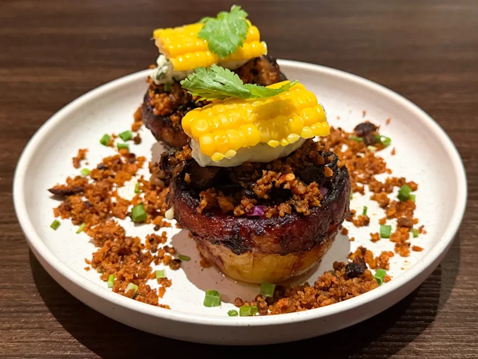 Kumpir, a popular Turkish street food, is the ultimate potato mash-up with varying textures from crispy skin, creamy mashed potatoes layered with sour cream, cabbage slaw and corn. — Picture by Lee Khang Yi