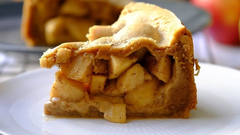Slice of apple pie on plate