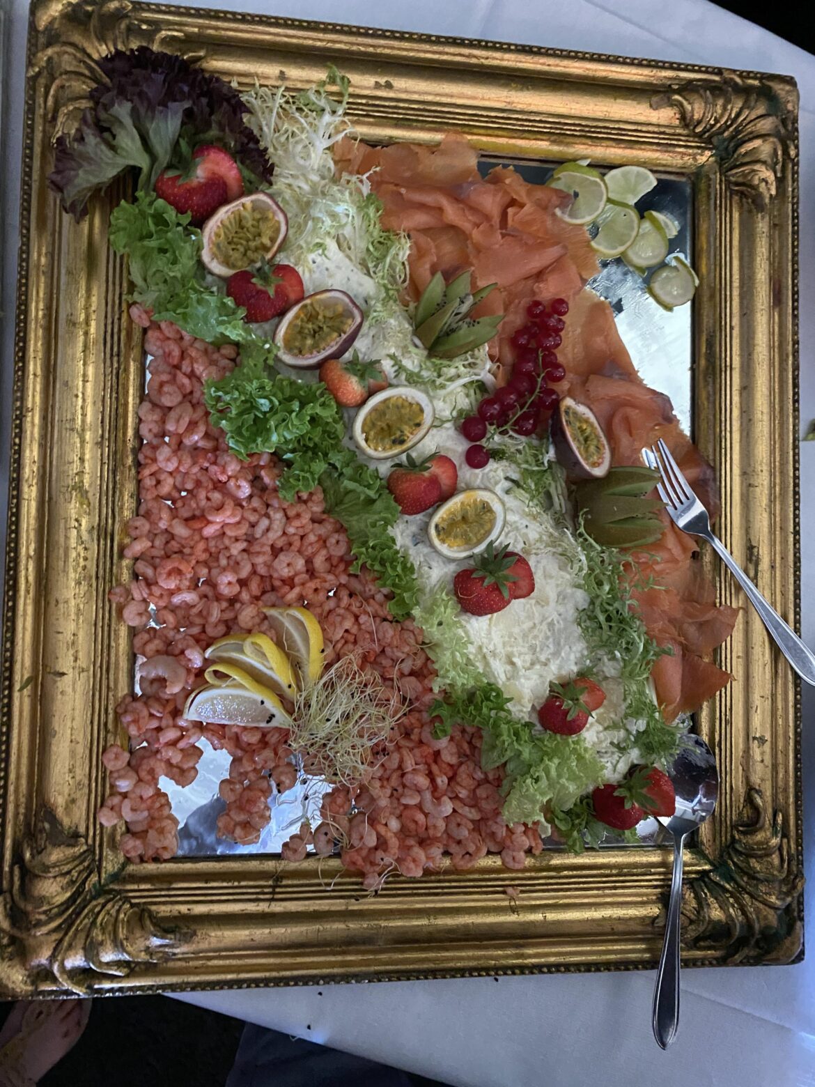 Shrimp and fish on a mirror