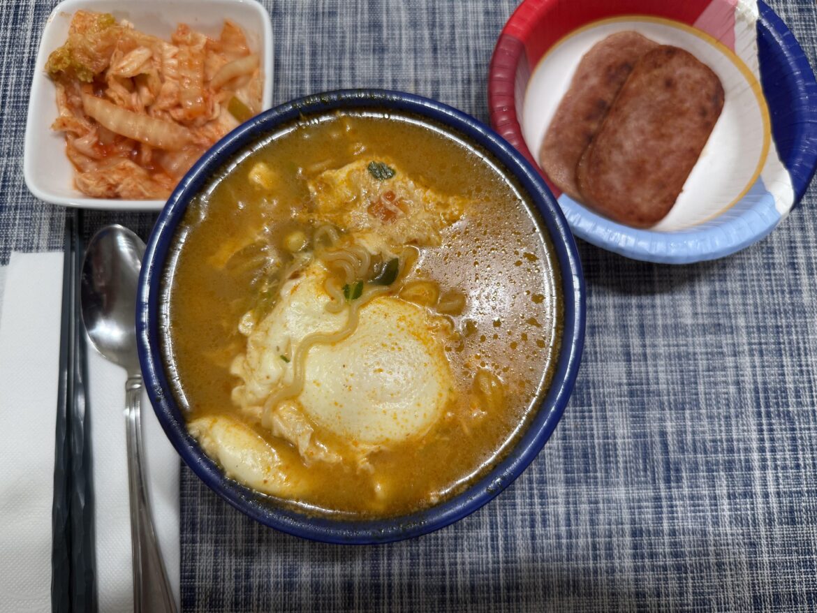 Shin Black with poached eggs and Spam