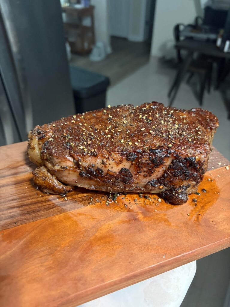 First cook. Nearly 2” thick strip 131 for 3hr. Finished in cast iron, quickly butter basted. Finished with a ton of freshly cracked pepper. Turned out great