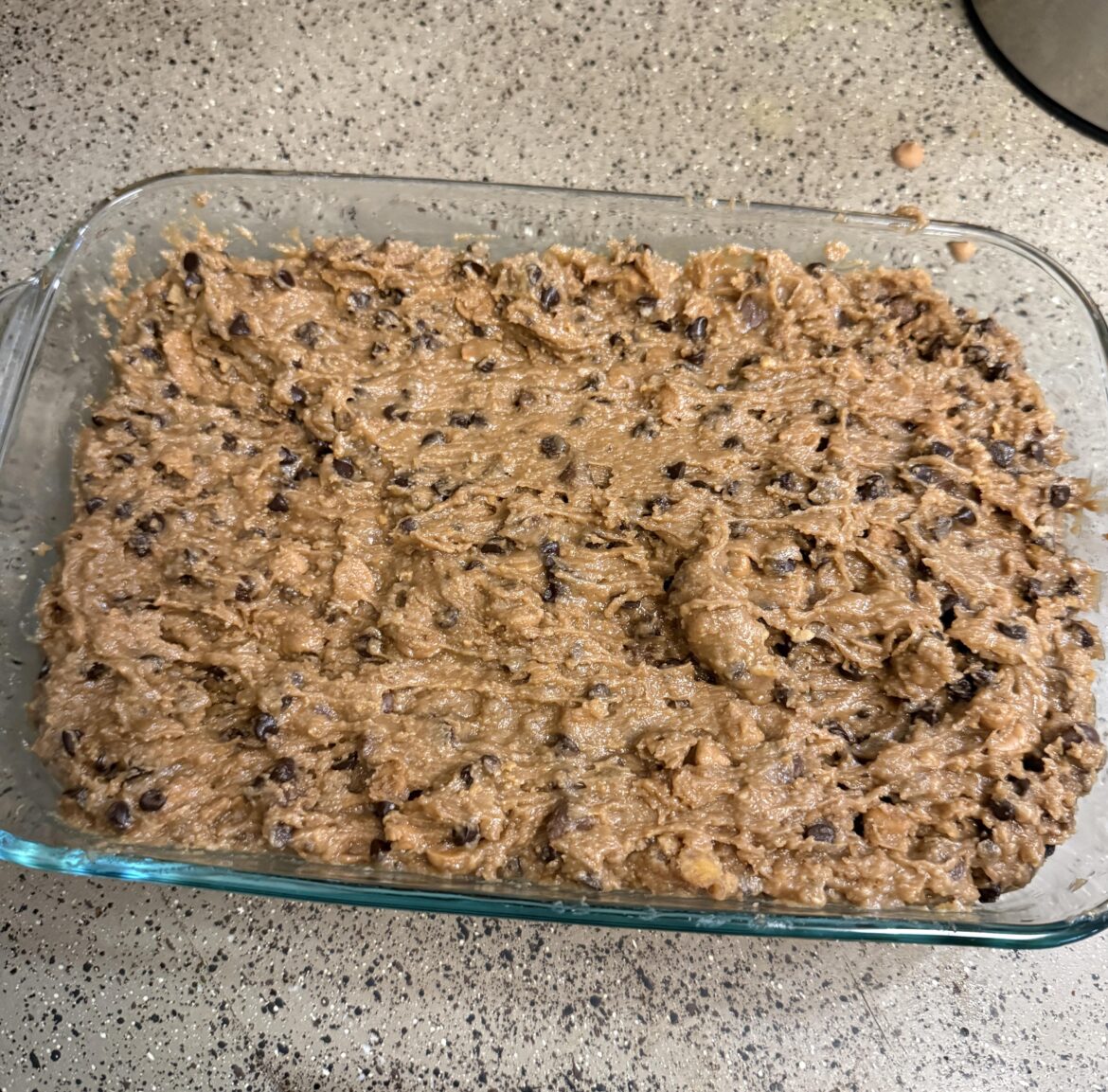 I simply asked my husband to bake chocolate chip cookie bars for me…