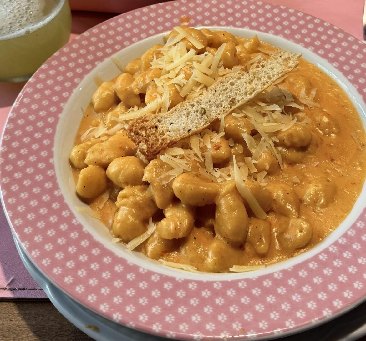 Potato gnocchi with creamy tomato sauce and parmesan