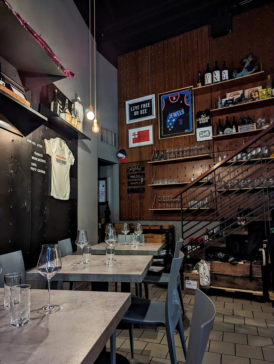 Interior of a dimly lit wine bar.