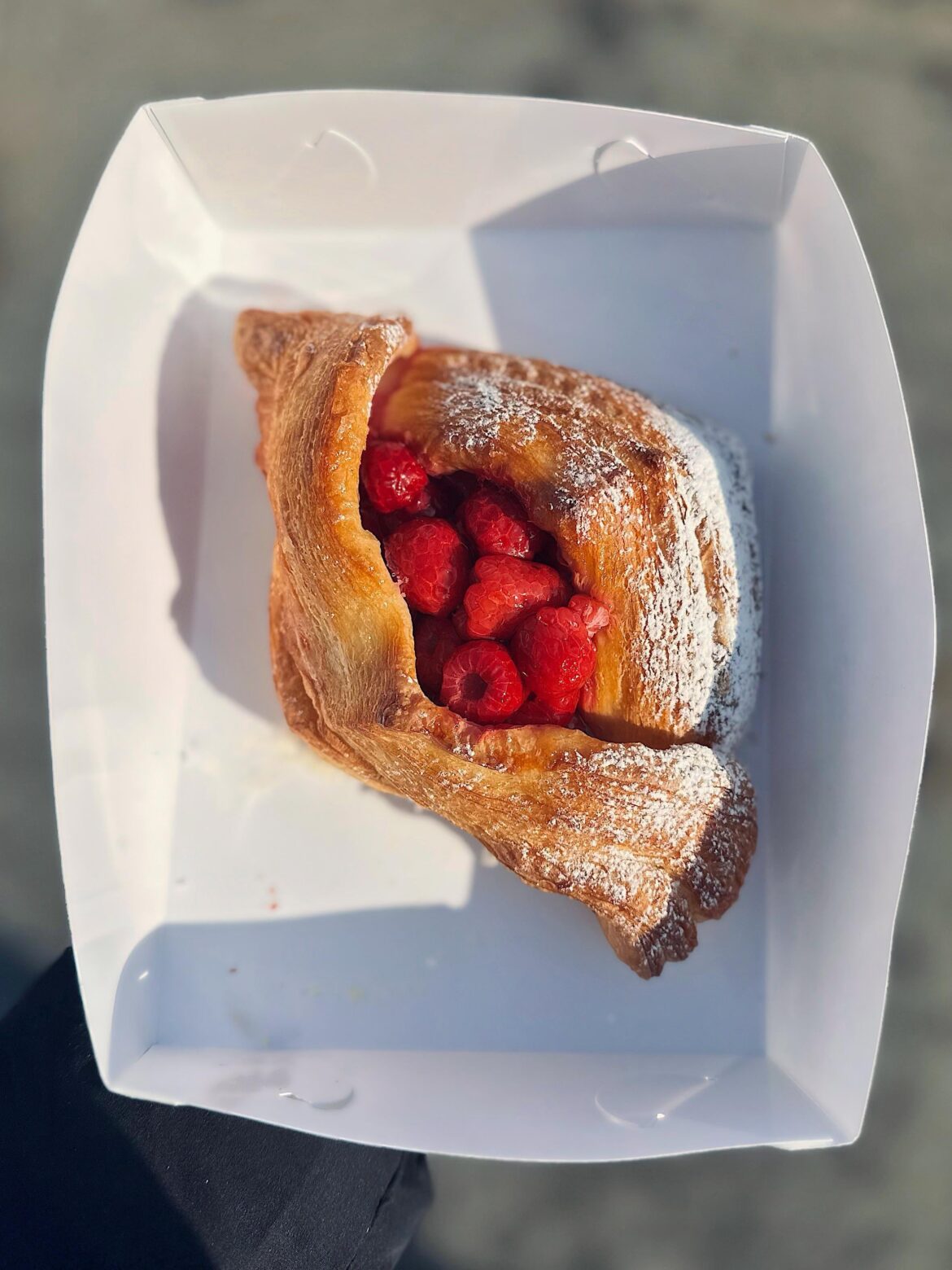 Pastry with custard cream and raspberries