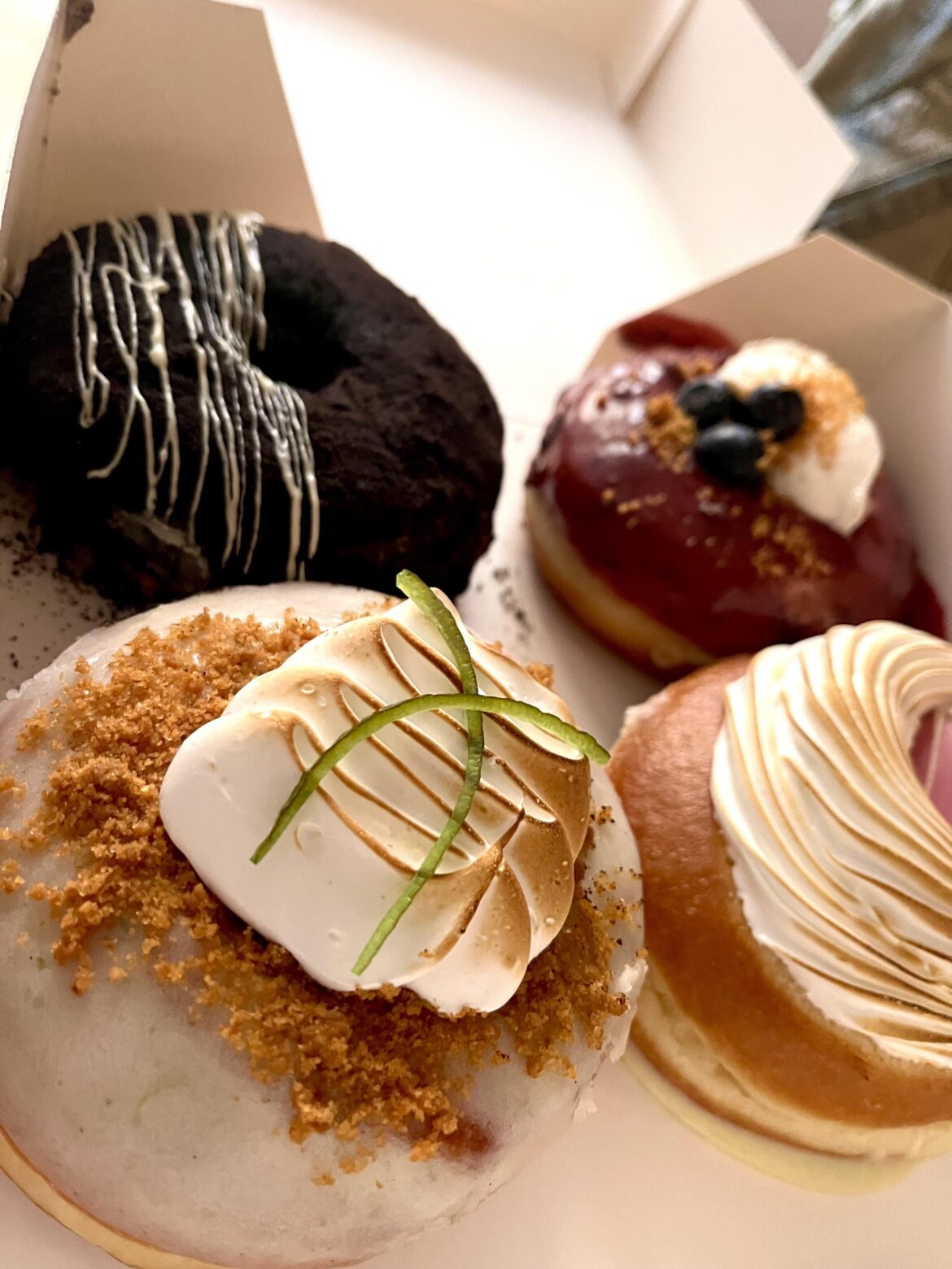 Donuts! Lemon pie triple chocolate berries and dulce de leche meringue