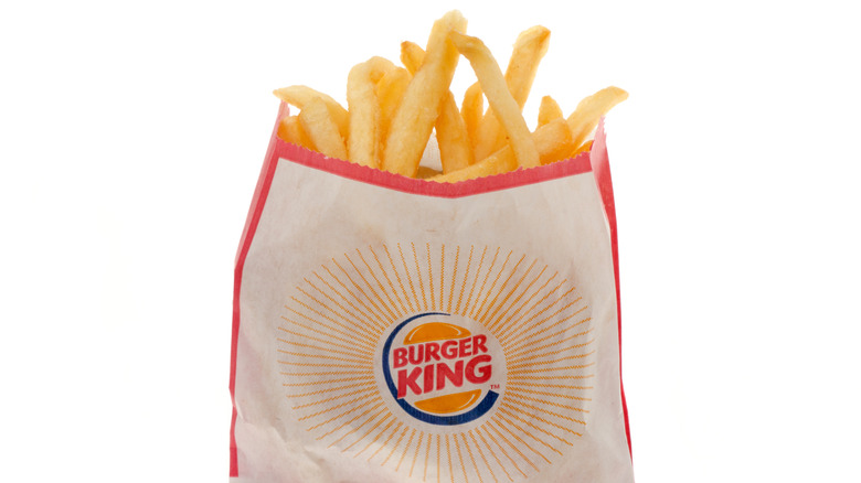 Bag of Burger King's regular fries against a white background