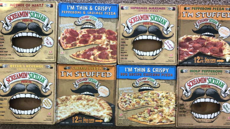 8 different boxes of Screamin' Sicilian frozen pizza.