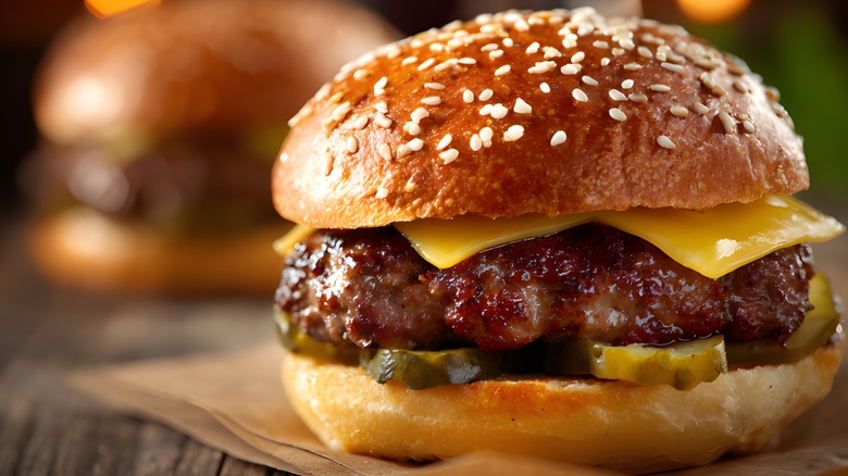 Cheeseburger up close on napkin