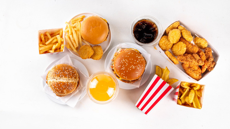 Variety of fast food on a white surface