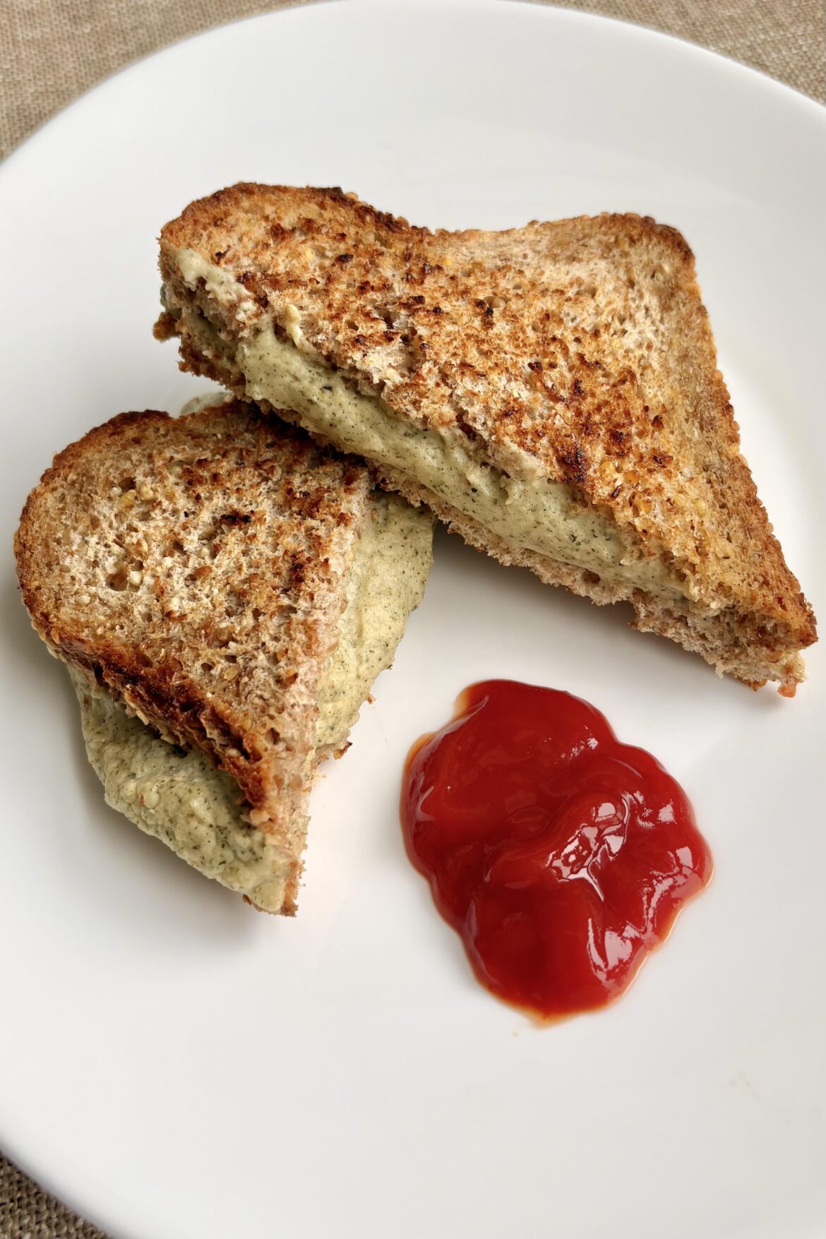 Ugly but delicious gooey stretchy vegan cheese made with hemp hearts