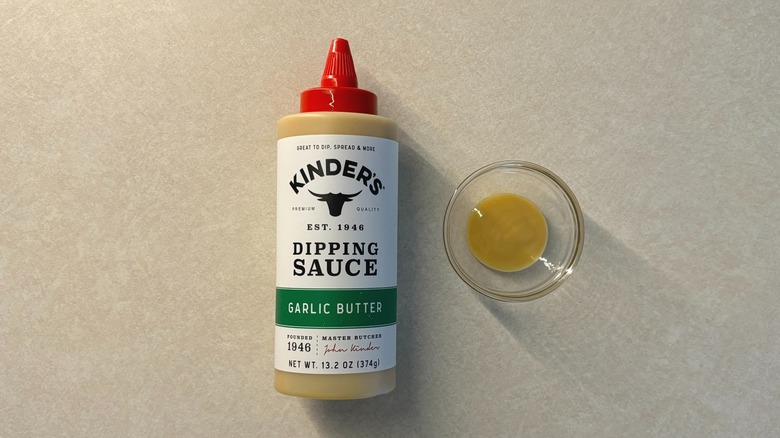 Kinder's Garlic Butter Dipping Sauce bottle and sauce in glass ramekin