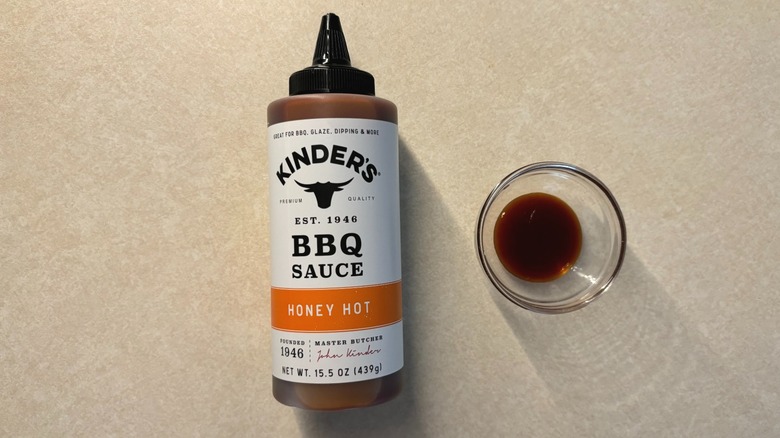 Kinder's Honey Hot BBQ Sauce bottle and sauce in glass ramekin