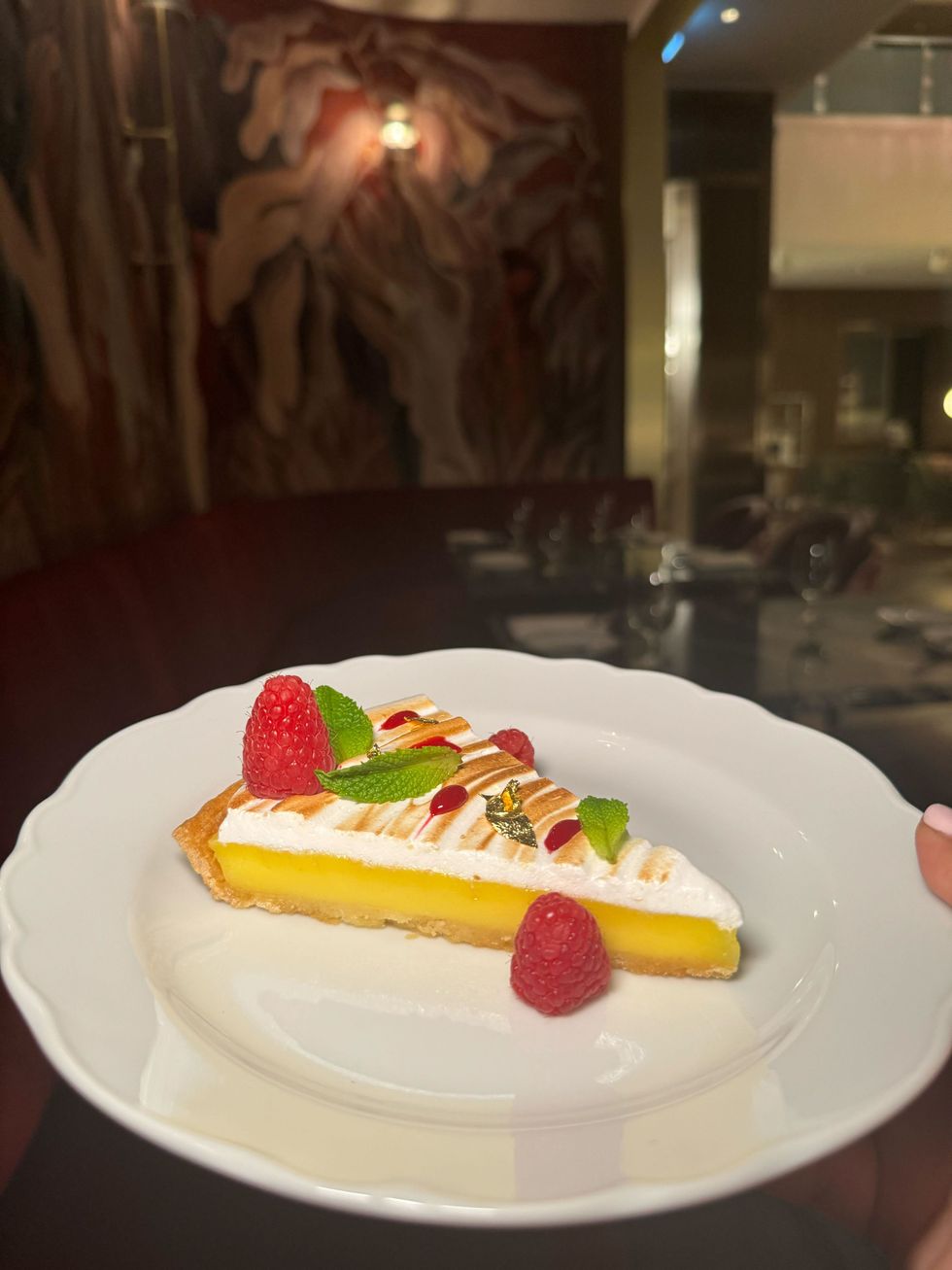 Lemon tart on a plate.