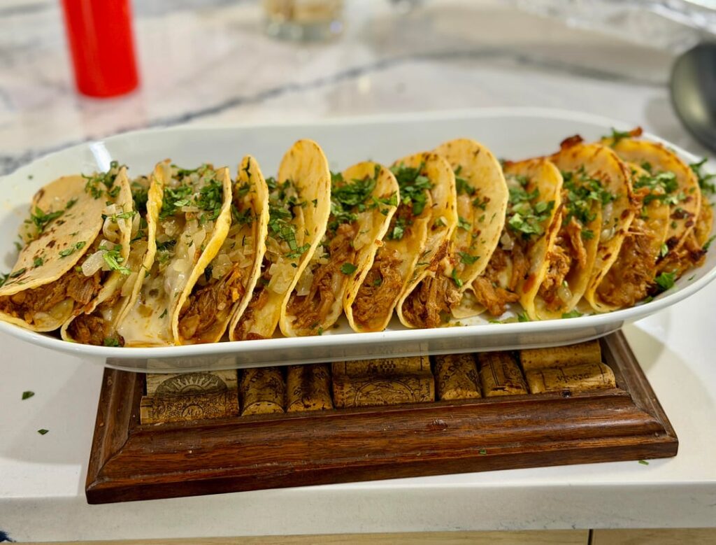 Quesacarnitas tacos with habanero crema.