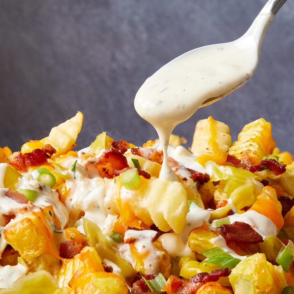 loaded nachos with pepperoncini, bacon and cheese