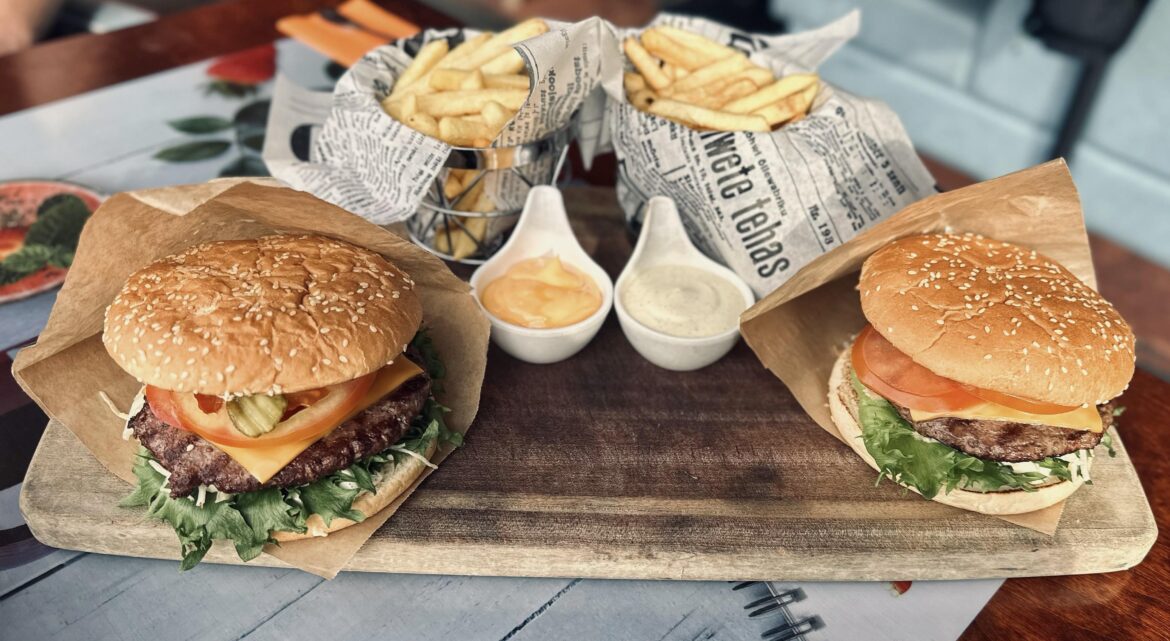 Meal for two: burgers, fries and sauces