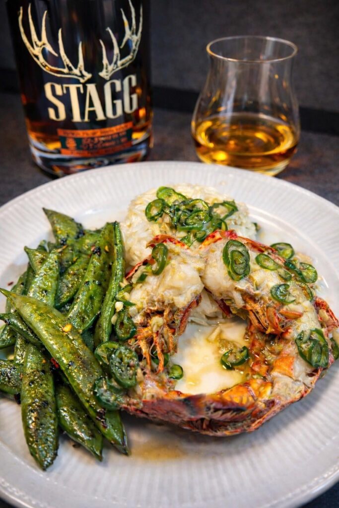 Lobster, snap peas, and brown water