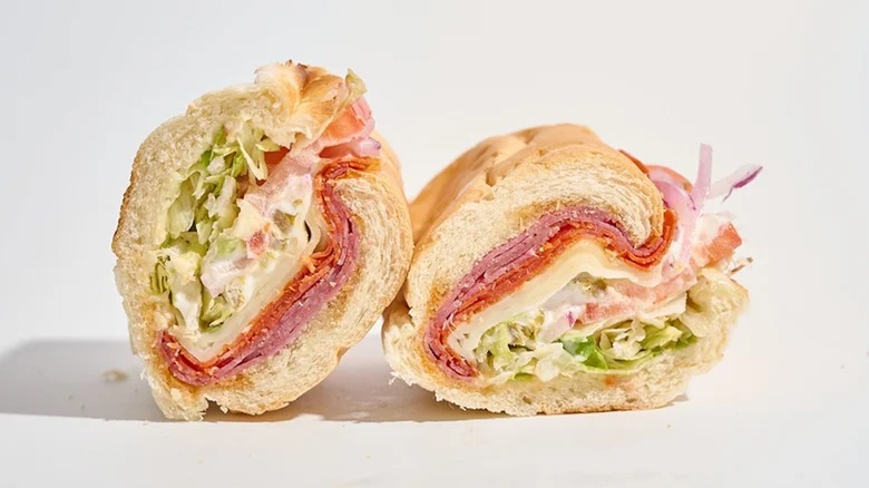 Subway's spicy Italian sandwich has been sliced in half to reveal its ingredients