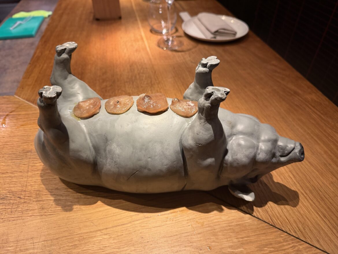 Pig nipples appropriately plated on a pig statue