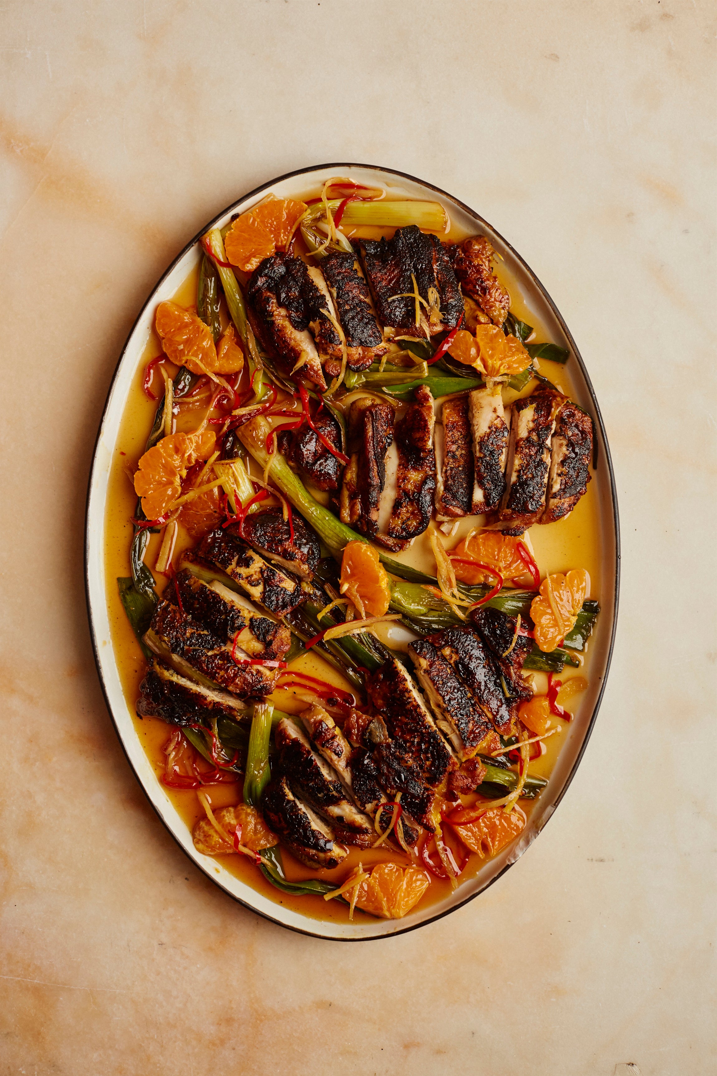 Charred chicken balanced with sweet caramel, citrus and chilli for a punchy, vibrant finish