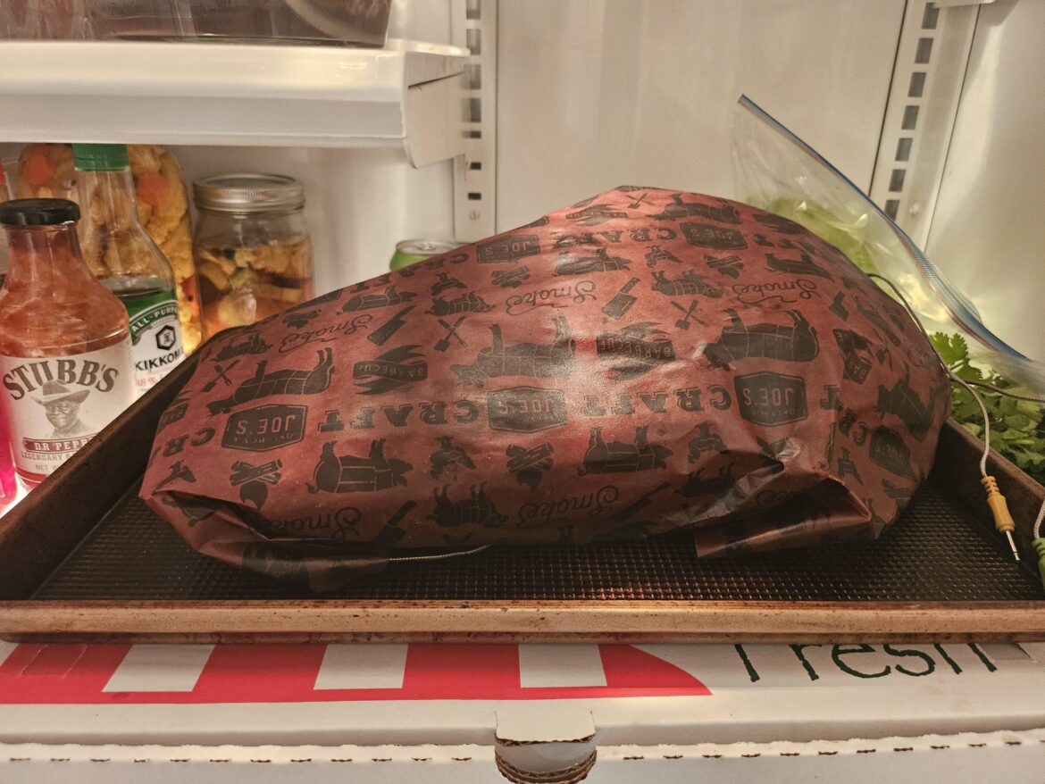 How would you reheat a whole, fully cooked brisket?