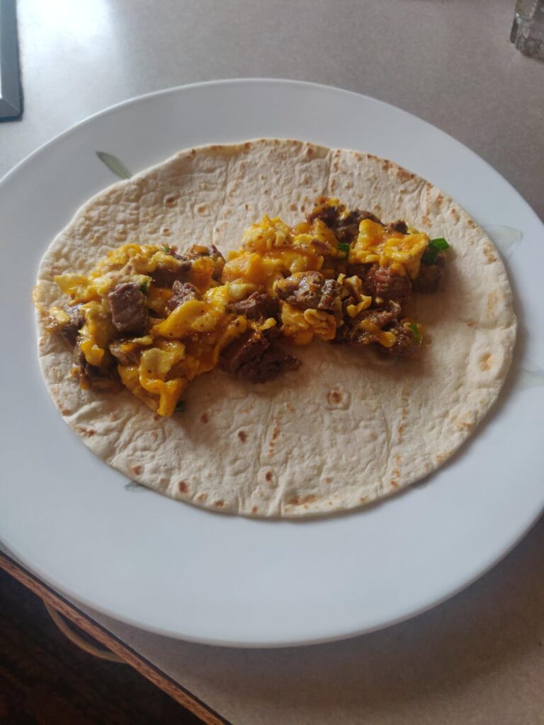 Steak, egg and cheese breakfast burrito