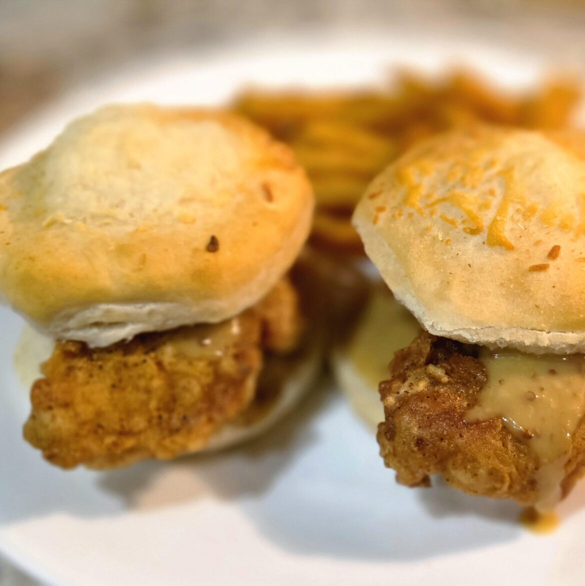 Chicken tenders on biscuits with homemade honey mustard