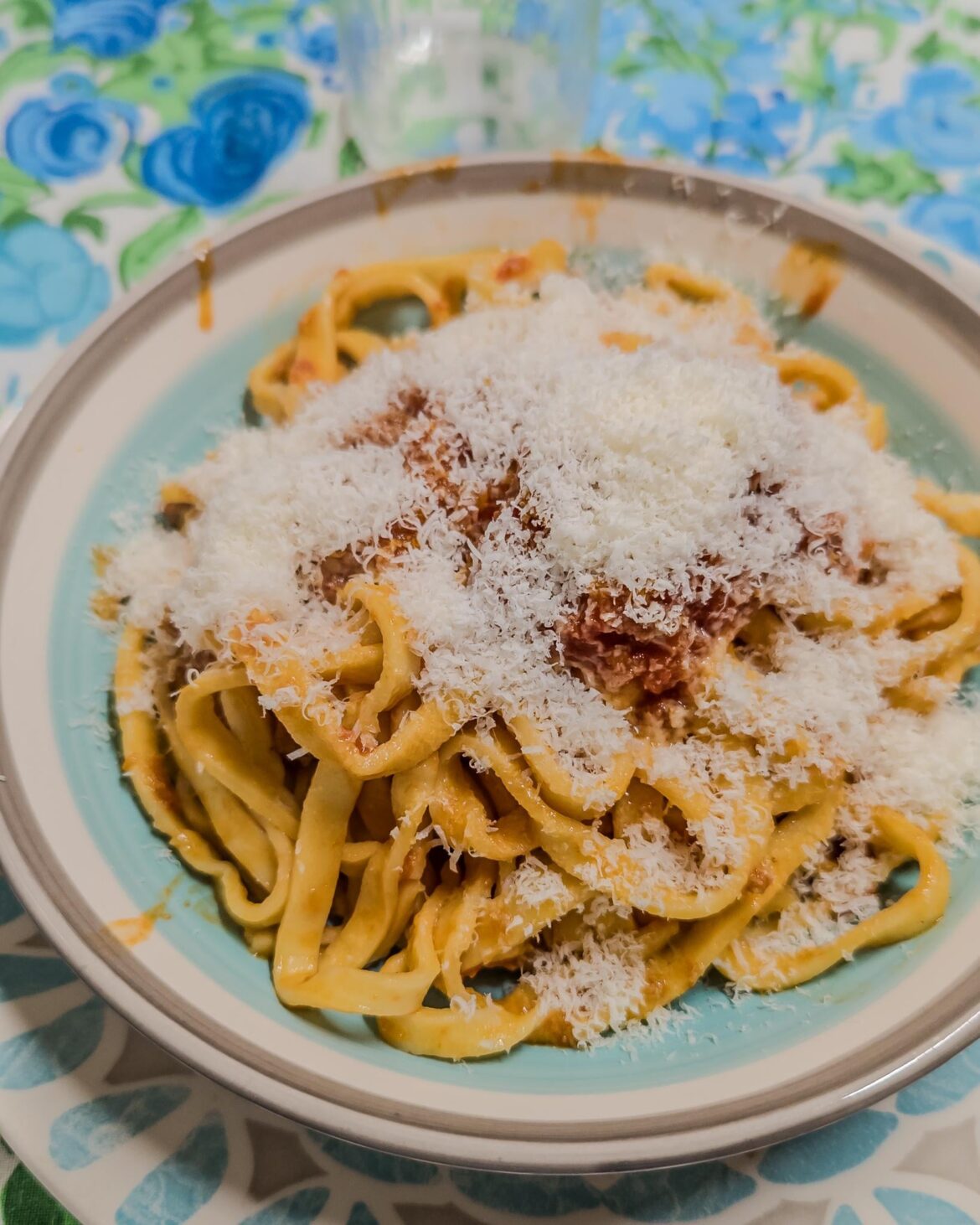 Handmade fettuccine with (handmade) sausage tomato sauce and pecorino cheese