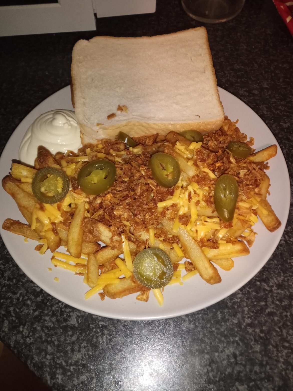 Chips 🍟, Cheese 🧀, Crispy Onions 🧅and Jalapenos 🌶️