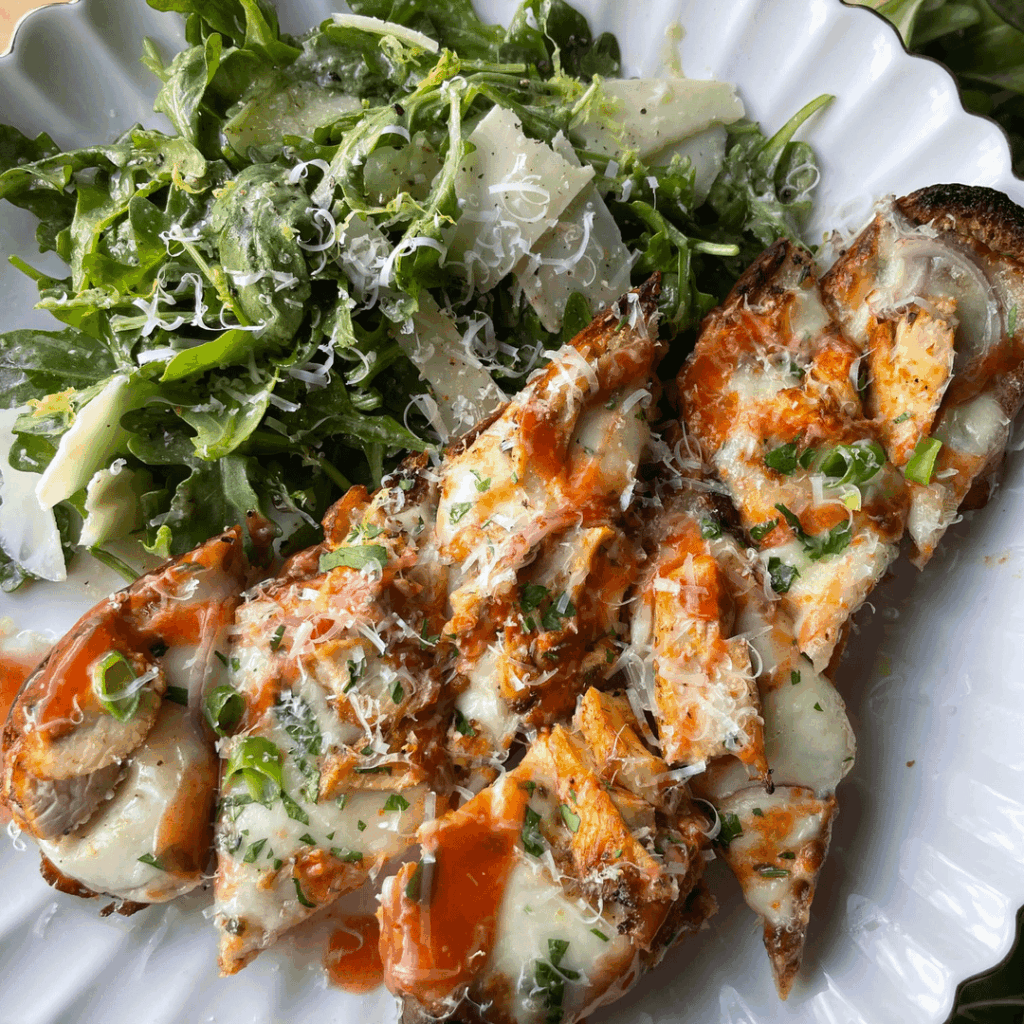 Buffalo chicken cheesy roasted garlic bread and arugula salad with parm for dinner tonight